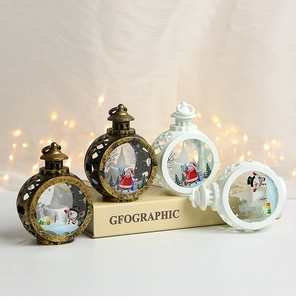 Close-up of LED Christmas lanterns featuring Santa and Snowman with warm glowing lights