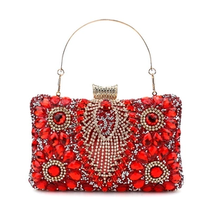 Red rhinestone evening clutch bag with floral peacock pattern and gold round handle