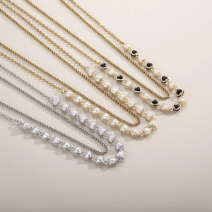 Minimalist double-layered heart pearl necklace in gold and silver finish for women