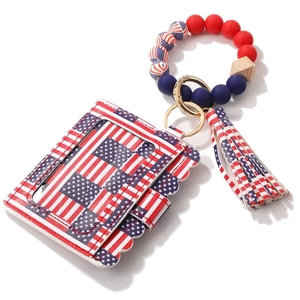 Detail of USA flag pattern silicone bead bracelet with card holder and tassel keychain