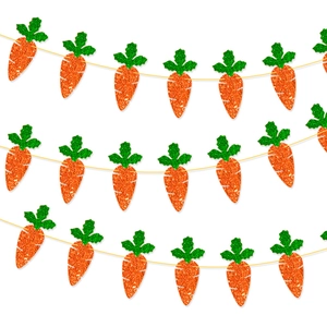 Close-up of glittery orange and green carrot banner flags for Easter party decoration