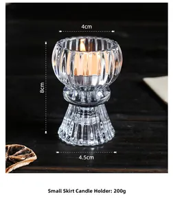 Detailed view of fluted glass candle holder with dimensions 8cm height and 4cm top width