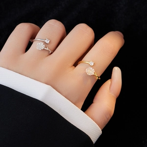 S925 silver camellia open ring featuring a frosted flower and sparkling round gemstone