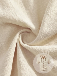 Macro detail of breathable cotton linen fabric texture on men's short sleeve hooded cardigan