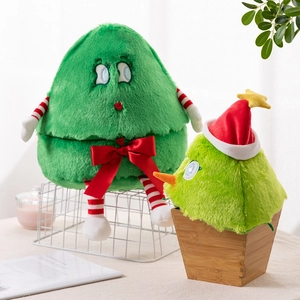 Close-up of plush Christmas tree doll with red striped limbs and festive bow detail