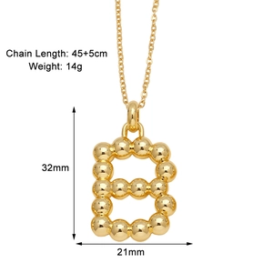 Detail view of golden letter B pendant with bead texture, 45+5cm chain and size markings