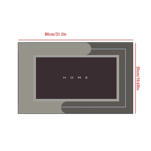 Close-up of gray geometric diatom mud bath mat with HOME text in 80x50cm size