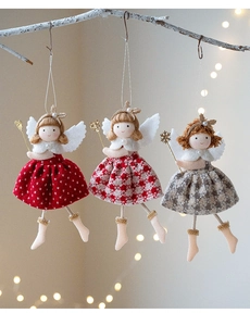 Three plush Christmas angel ornaments featuring red dots and plaid fabric skirts