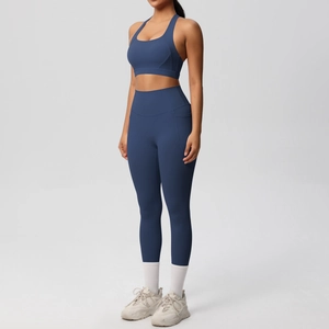 Detail of high-waisted navy blue yoga set with ergonomic seams and stretch fabric