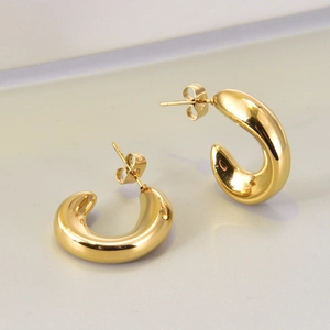 Boucles d'oreilles créoles C ondulées style français en acier titane plaqué or 18K