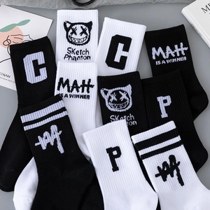 Mid-calf cotton socks in black and white featuring street style graphic prints and letters