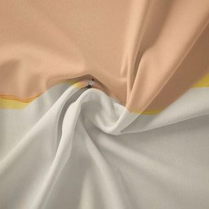 Detail of bohemian tapestry fabric showing soft twill texture and artistic print