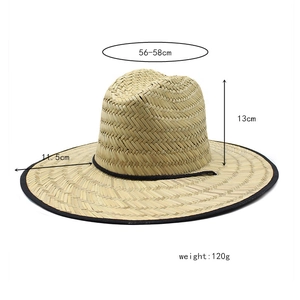 Detail shot of straw beach hat showing 11.5cm brim and specifications on white background