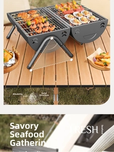 Close-up of portable charcoal BBQ grill cooking shrimp and scallops on a tripod stand