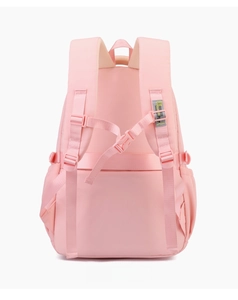 Pink school backpack rear view showing padded straps and luggage belt for travel