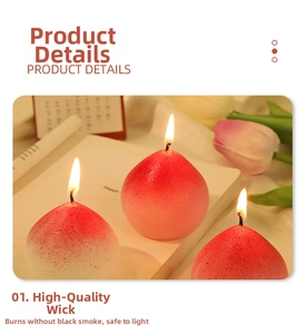 Detail of peach-shaped scented candles showing realistic texture and natural cotton wick