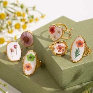 French vintage floral resin ring with real dried flowers in a gold stainless steel base