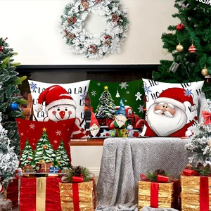 Set of four Christmas pillow covers with festive gnome and tree prints for home decor