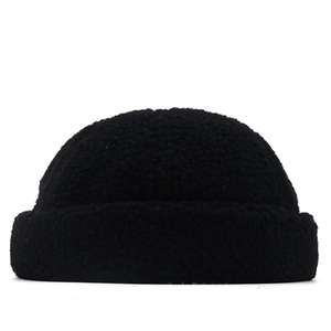 Minimalist black faux lamb wool docker hat with warm textured sherpa fabric for winter