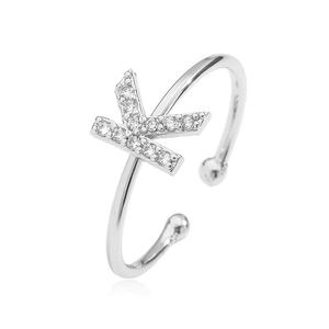 Detail of silver letter K open ring with cubic zirconia inlay and adjustable design