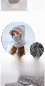 Detailed close-up showing the thick grey plush lining of the winter knitted warm hat