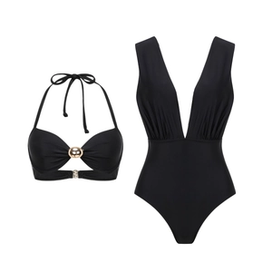 Detail view of black one-piece swimsuit and bikini with V-neck and golden metal buckle