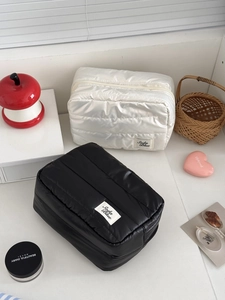 Quilted down fabric rectangular cosmetic bags in black and white with top zippers