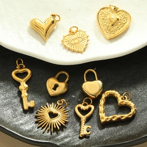 Golden heart, key and sunburst pendants made of stainless steel for DIY jewelry making