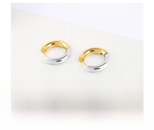 Detail view of 4mm stainless steel two-tone hoop earrings with gold and silver vacuum plating