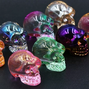Iridiscent crystal skull figurines with metallic finish for Halloween home decor