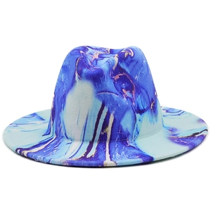 Detailed close-up of fedora hat with blue and purple marble print texture on felt
