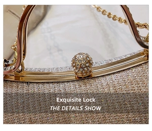 Detail of elegant evening bag featuring a rhinestone-encrusted spherical gold clasp