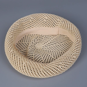 Knitted hollow beret in beige featuring inner elastic sweatband and breathable texture