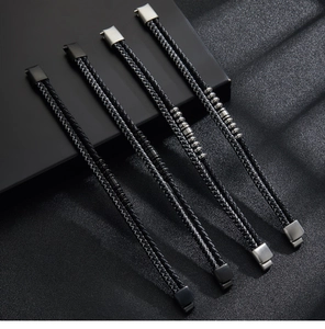 Detail of multi-layer braided leather bracelets with stainless steel magnetic clasps
