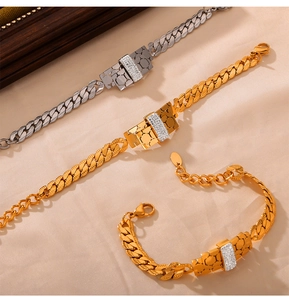 Detail of Y-letter zircon pendant necklace with 18k gold plated Cuban chain texture