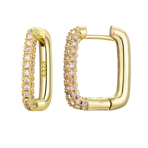 Macro shot of gold S925 sterling silver hoop earrings with pink zircon stone inlay