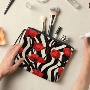 Floral tulip makeup bag with red waves on beige background with beauty accessories