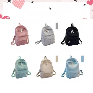 Detail view of corduroy schoolbags in six colors with multi-pocket zipper design