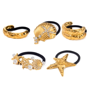5-piece gold ocean themed hair ties with starfish and pearl accents on white backdrop