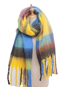 Detail of soft thick boucle yarn plaid scarf with yellow and blue checkered fringe
