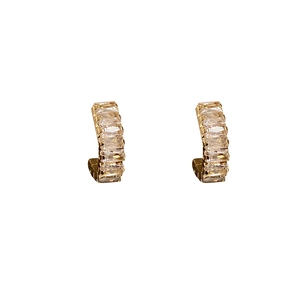 Minimalist geometric gold C-shaped hoop earrings with baguette-cut zircons for women
