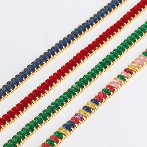 Detail of tennis chains in blue, red, green and multicolor with rectangular zircon stones