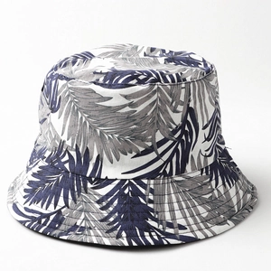 Close-up of durable cotton canvas texture and tropical palm leaf print on bucket hat