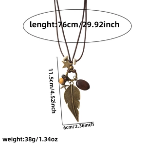 Detailed view of bohemian feather necklace showing 76cm length and 11.5cm pendant size