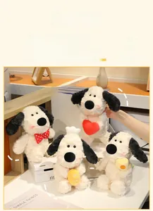 Close-up of four plush dogs with hearts and ties in a cozy indoor setting