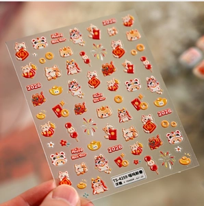 Detail of 2026 Lunar New Year nail stickers with 5D embossed lucky cat and lion motifs