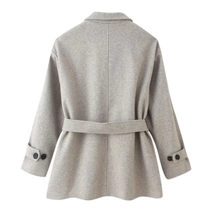 Back view of light grey women's wool coat with waist belt and decorative cuff buttons
