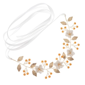 Detail of bridal headband with gold leaves, orange beads and white flowers on white background