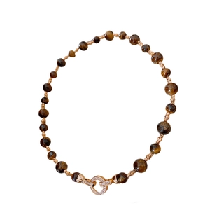 Retro tiger eye stone necklace with gold-plated spacer beads and cubic zirconia clasp