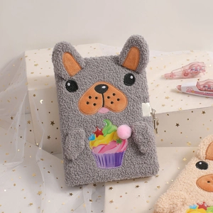 Detail of grey plush dog notebook with a security lock and cupcake embroidery